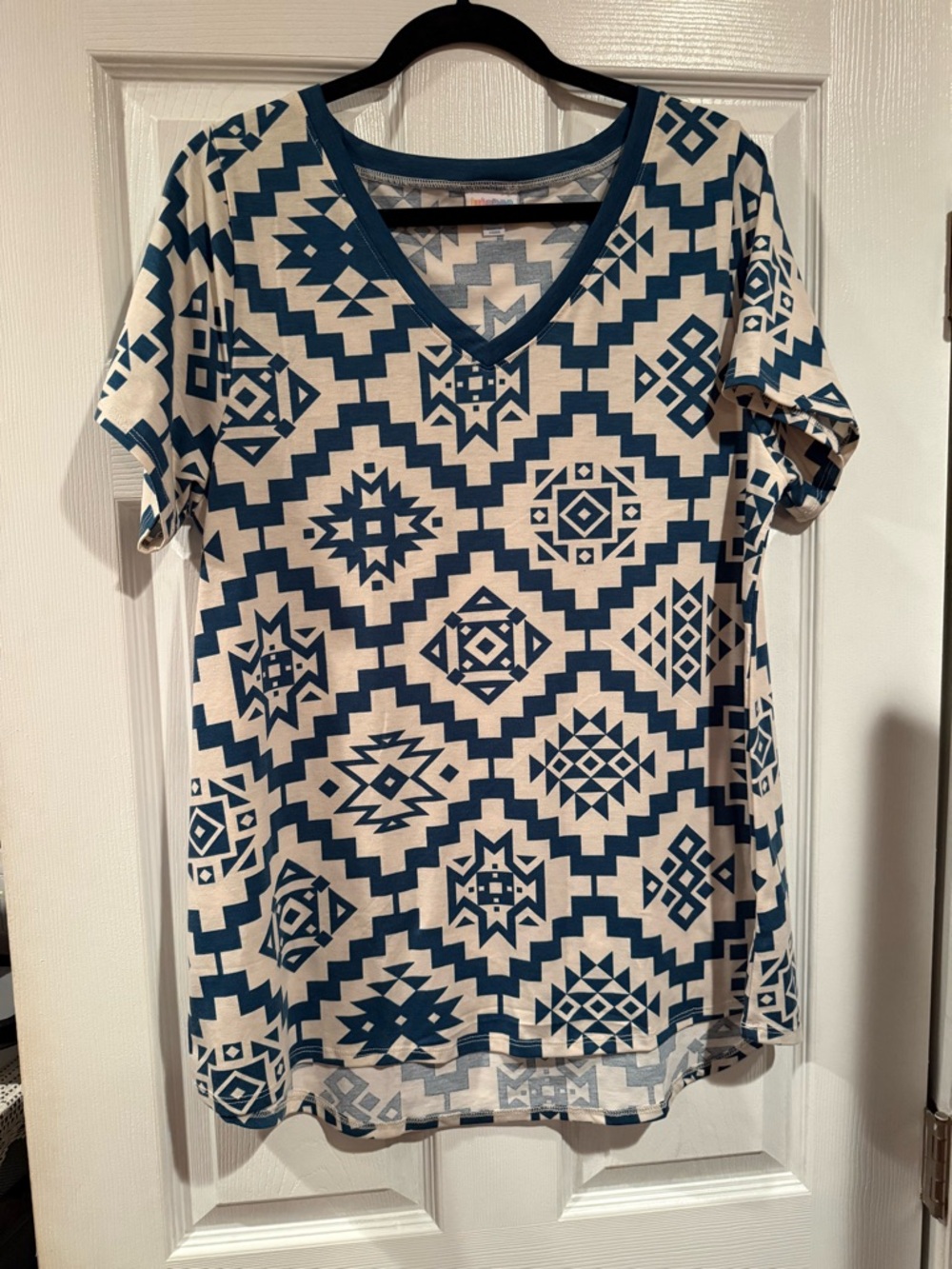 LuLaRoe Cream and Teal Geometric V-Neck Top